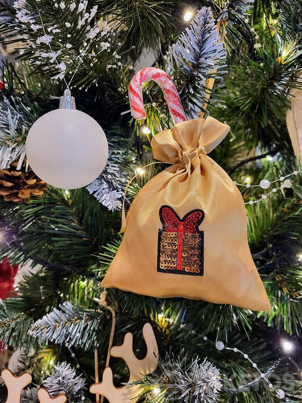 Adornos navideños con regalos: bolsa con piruleta