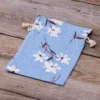 Bolsitas estilo de lino con la impresión 15 x 20 cm - natural / flores azules Viajes