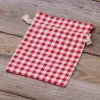 Bolsita estilo lino con la impresión 15 x 20 cm - natural / enrejado rojo Para niños
