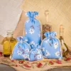 Bolsita estilo lino con la impresión 16 x 37 cm - natural / flores azules Para niños