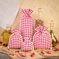 Bolsita estilo lino con la impresión 18 x 24 cm - natural / enrejado rojo Bolsas con impresion