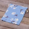 Bolsita estilo lino con la impresión 18 x 24 cm - natural / flores azules Para niños