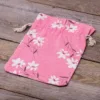 Bolsita estilo lino con la impresión 18 x 24 cm - natural / flores rosadas Viajes