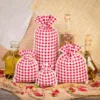 Bolsa estilo lino con la impresión 30 x 40 cm - natural / enrejado rojo Bolsas con impresion