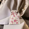 Bolsitas estilo lino con la impresión 12 x 15 cm - natural / rosas Baby Shower