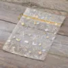 Bolsas de organza 15 x 20 cm - Navidad / 8 Productos cosméticos