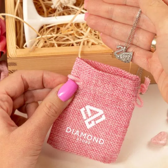 Bolsa de yute rosa con el logotipo de la empresa