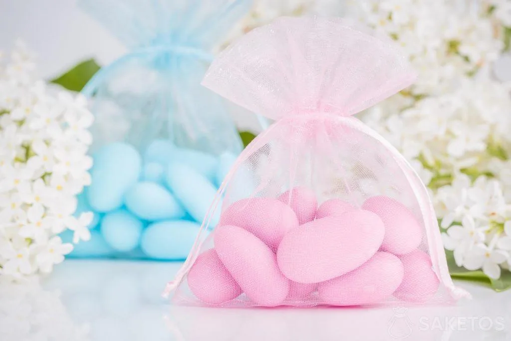 Baby shower, un año, bolsas de bautizo almendras rosas y azules
