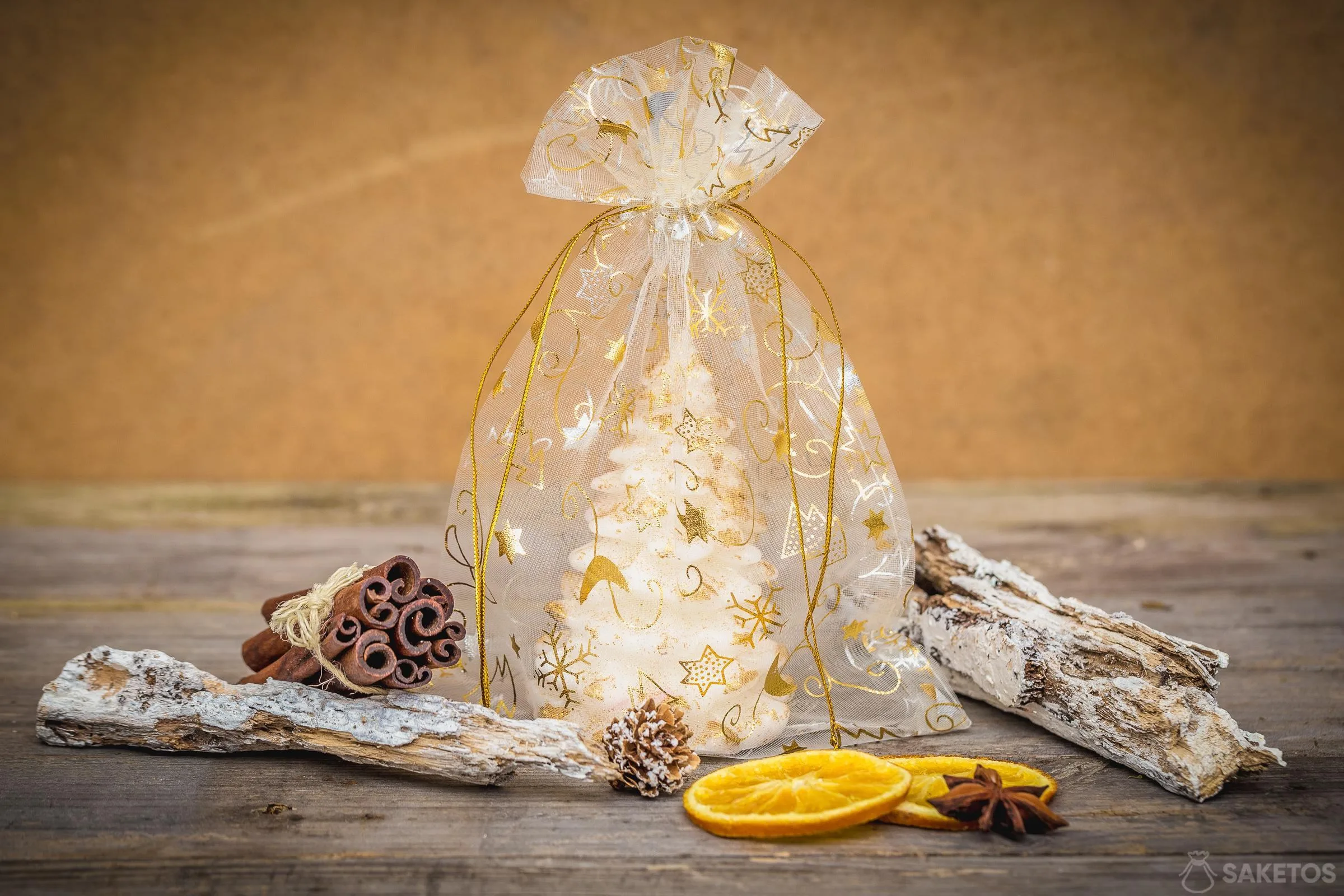 Vela: árbol de Navidad en una bolsa de organza.