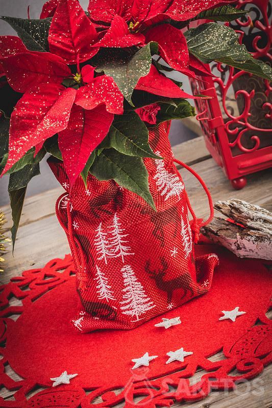 Bolsa de yute con estampado navideño como cubre macetas