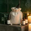 Bolsas de lino con aceites esenciales - embalaje para regalos de bienestar